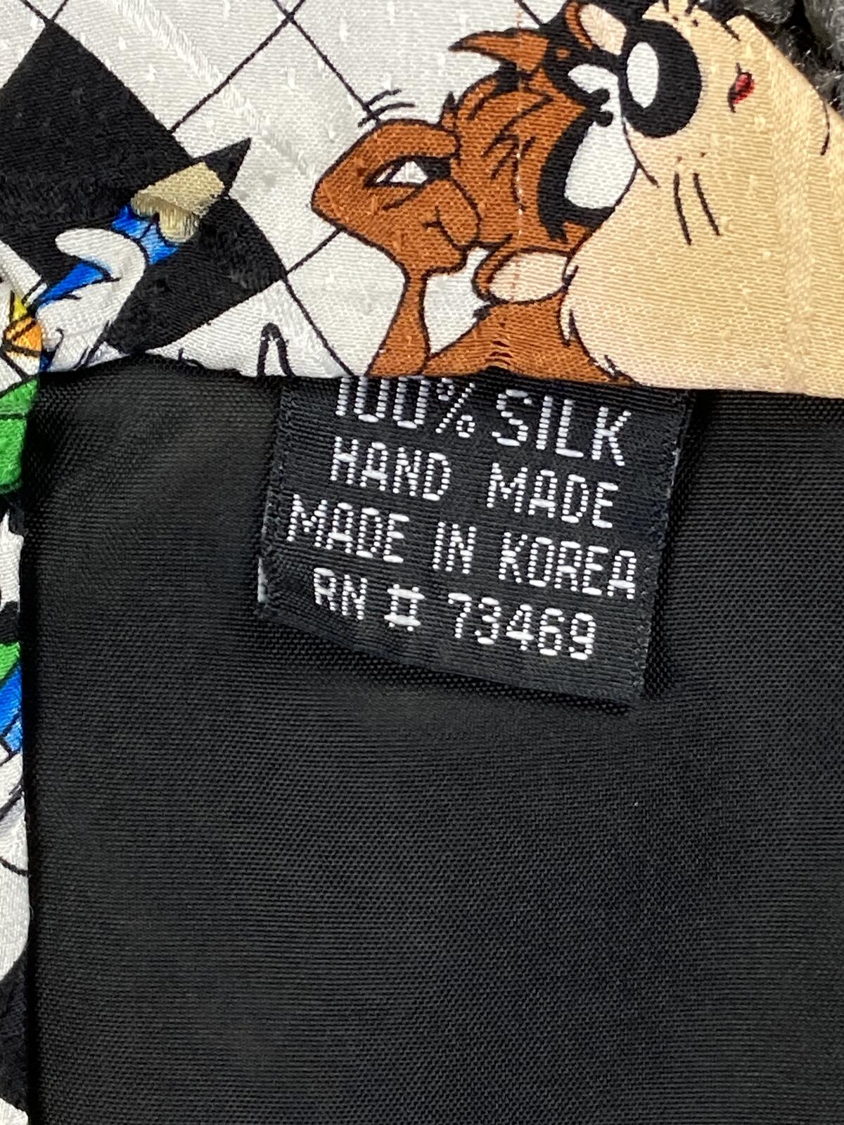 Vintage 1997 Looney Tunes Warner Bros Studio Store 100% Silk Crossword Tie 90s