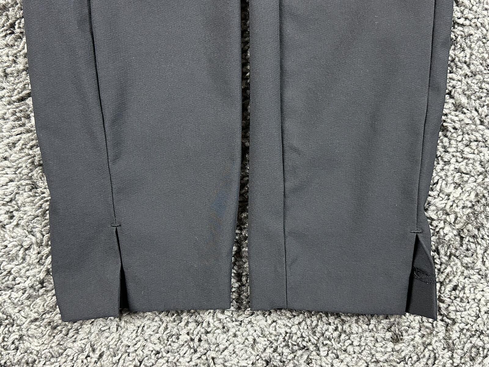 Athleta Wander Slim Pant Black Trek Tech High Rise Back Zip Ankle Slit Sz 4P