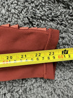 Athleta salutation Stash Pocket II Twist 7/8 Leggings Powervita Rust Red XS