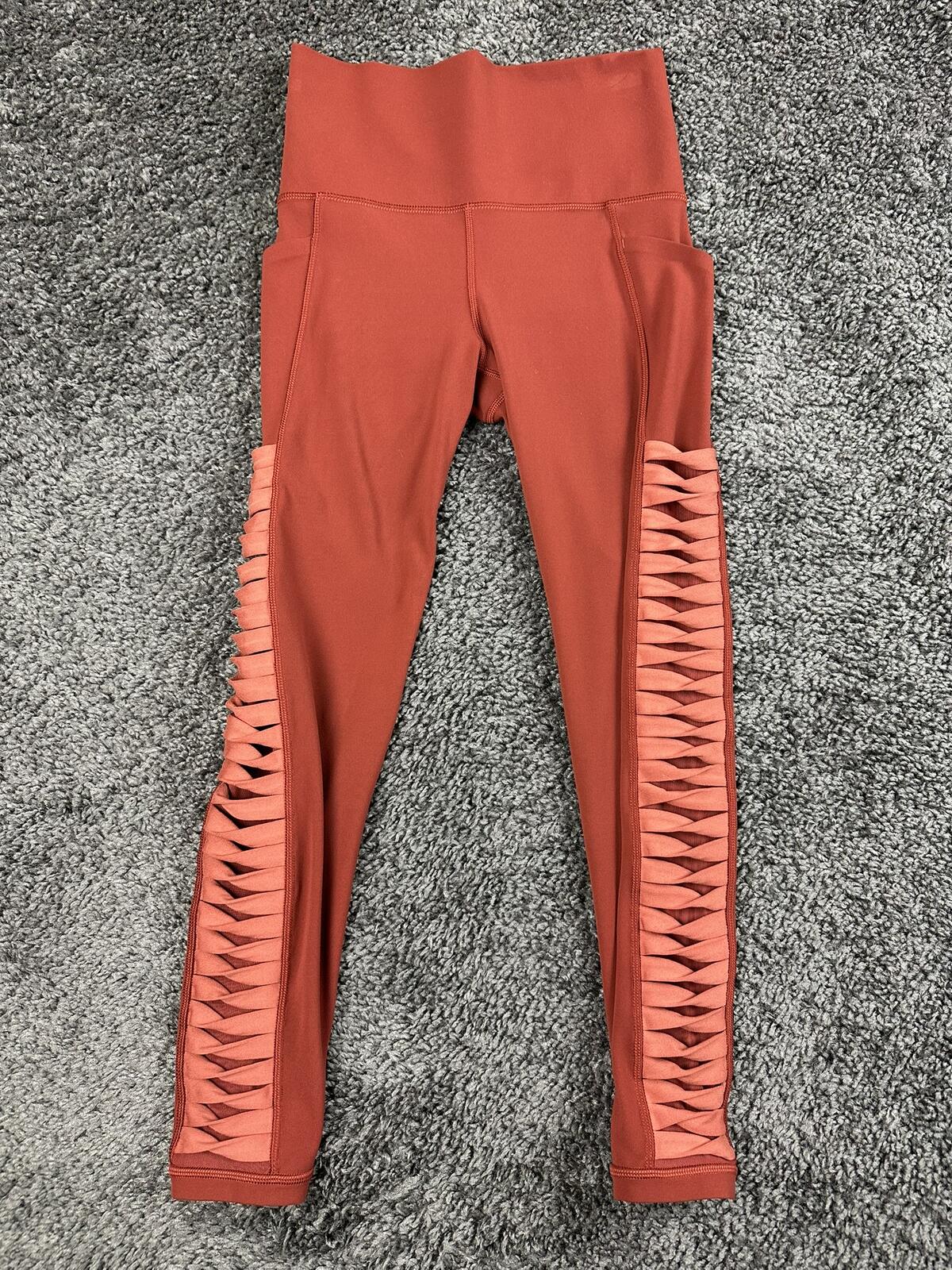 Athleta salutation Stash Pocket II Twist 7/8 Leggings Powervita Rust Red XS