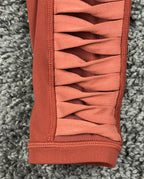Athleta salutation Stash Pocket II Twist 7/8 Leggings Powervita Rust Red XS