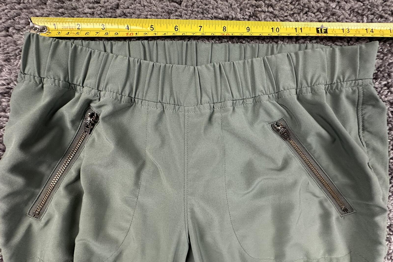 Athleta Aspire Ankle Green Ruched Stretch Jogger Pant Zip Pockets Womens Size 4
