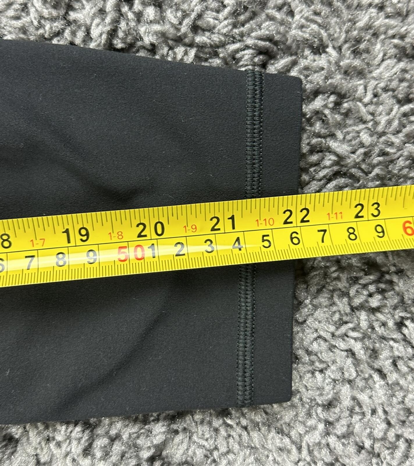 Athleta Salutation Stash 7/8 Tight Leggings Black Pockets Yoga Pants Size Large