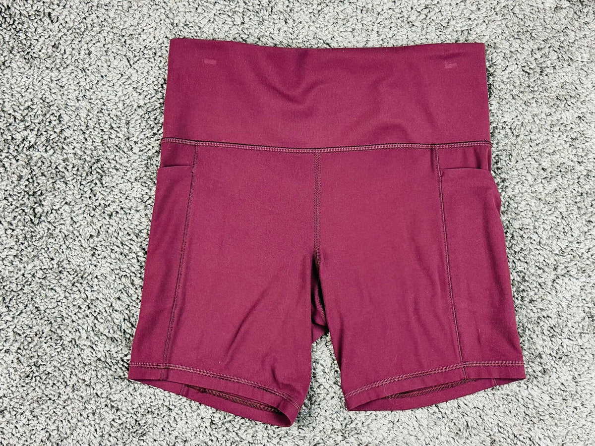 Athleta Womens M Cranberry Red Salutation Stash Pocket II 7" Short Powervita