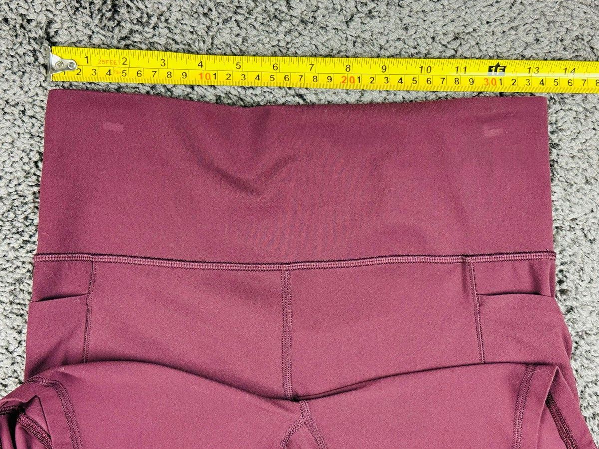 Athleta Womens M Cranberry Red Salutation Stash Pocket II 7" Short Powervita