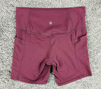 Athleta Womens M Cranberry Red Salutation Stash Pocket II 7" Short Powervita