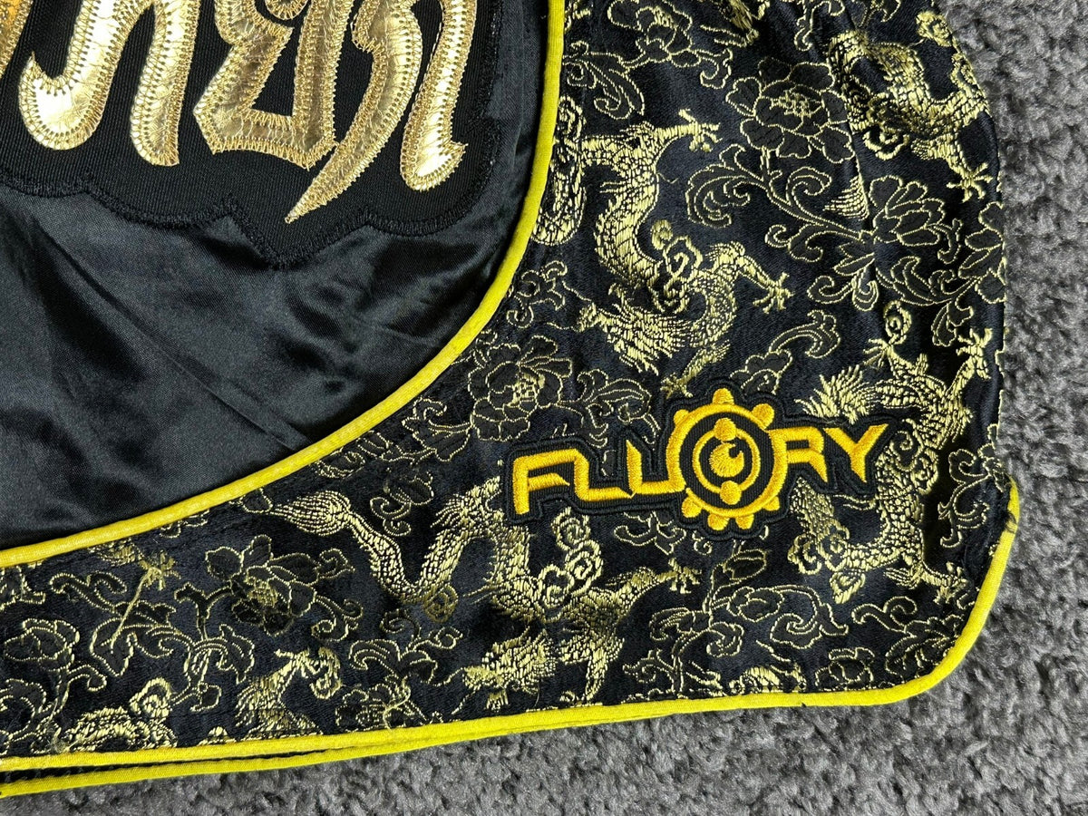 FLUORY Mens XS Black Muay Thai Shorts Gold Brocade Dragon Thai Script Boxing