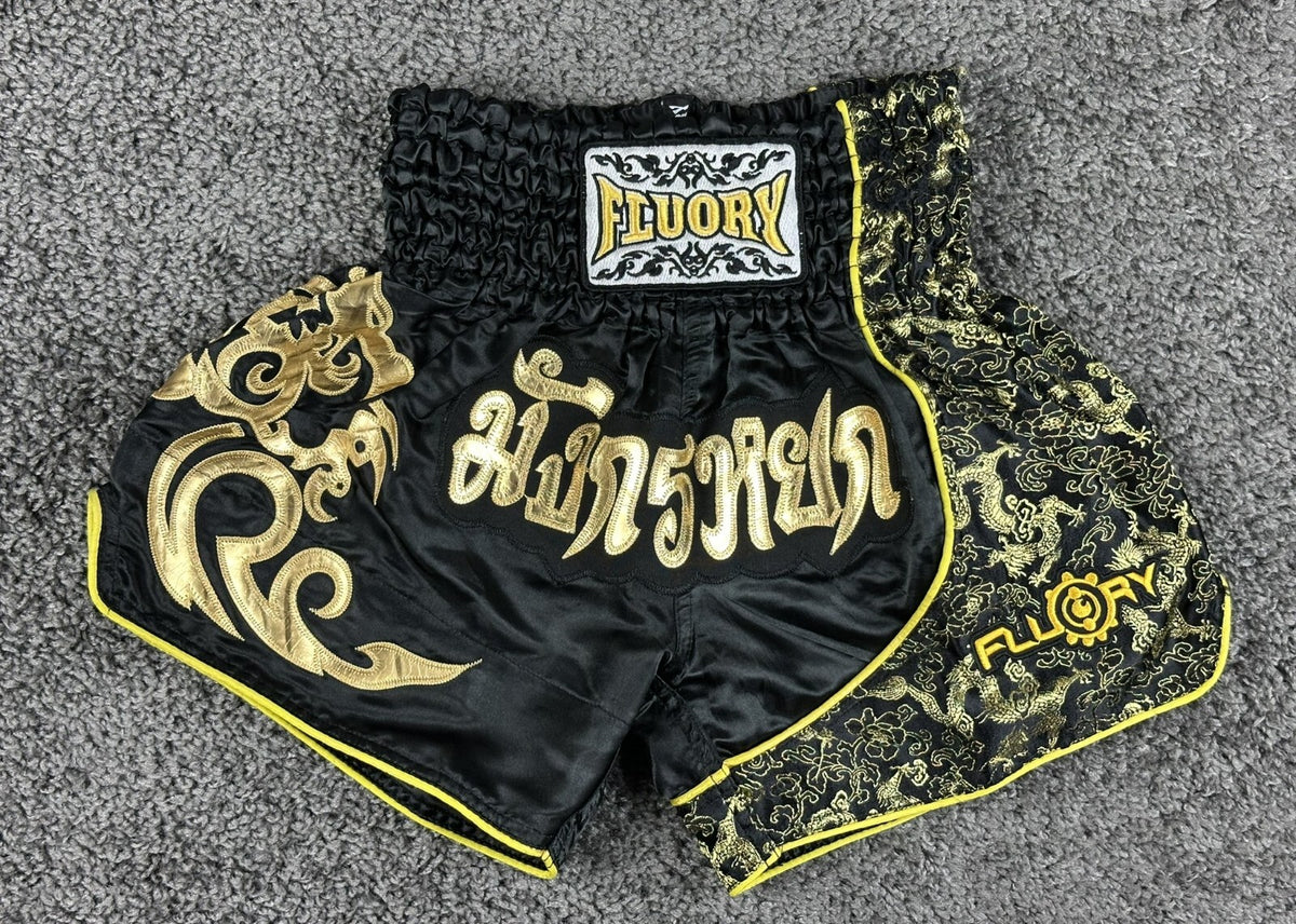 FLUORY Mens XS Black Muay Thai Shorts Gold Brocade Dragon Thai Script Boxing