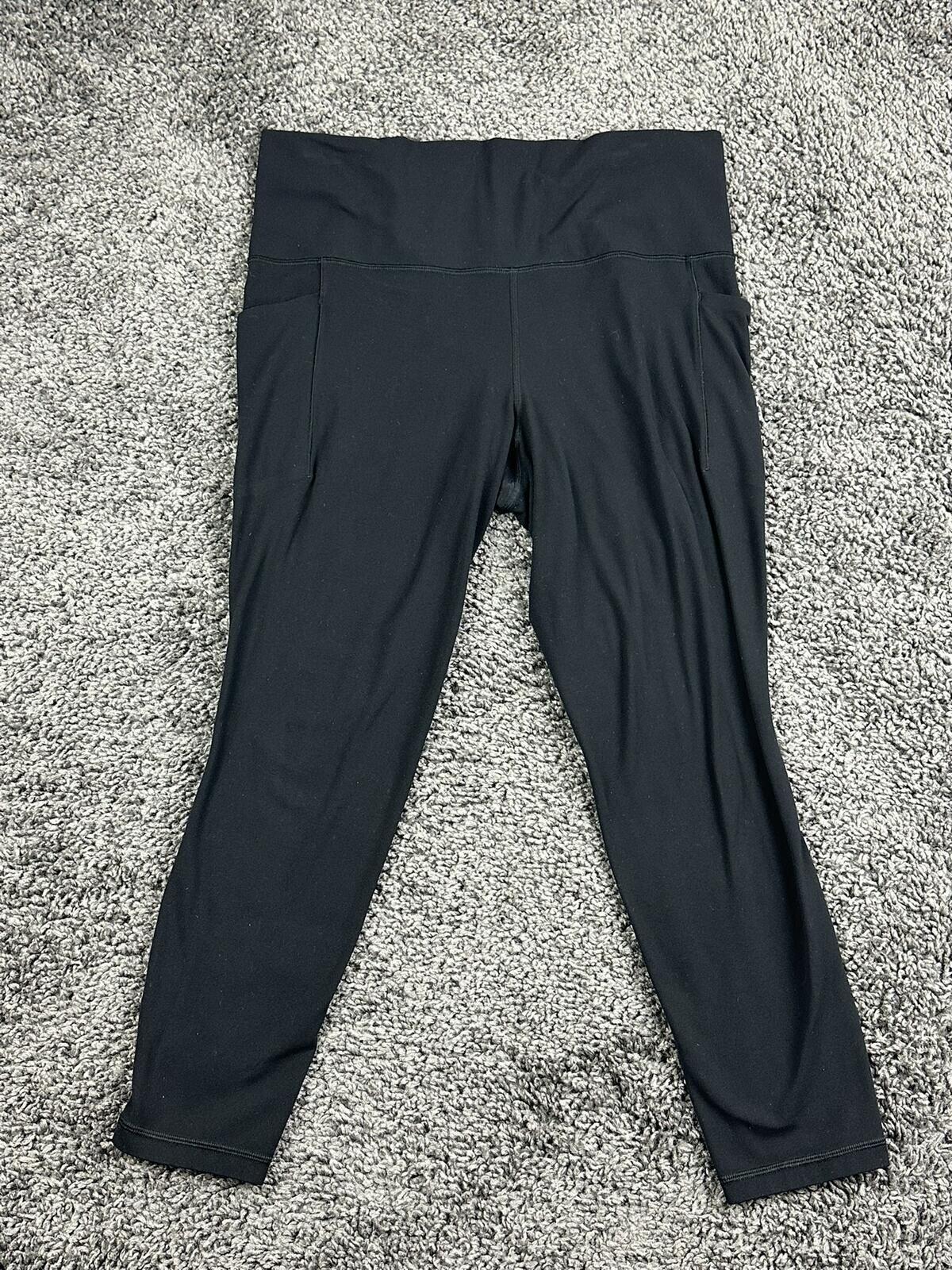 Athleta Salutation Stash 7/8 Tight Leggings Black Pockets Yoga Pants Size Large